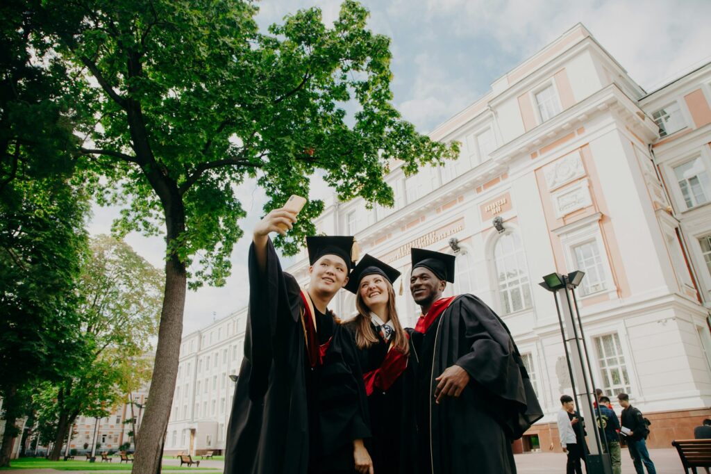 Graduates with their diplomas